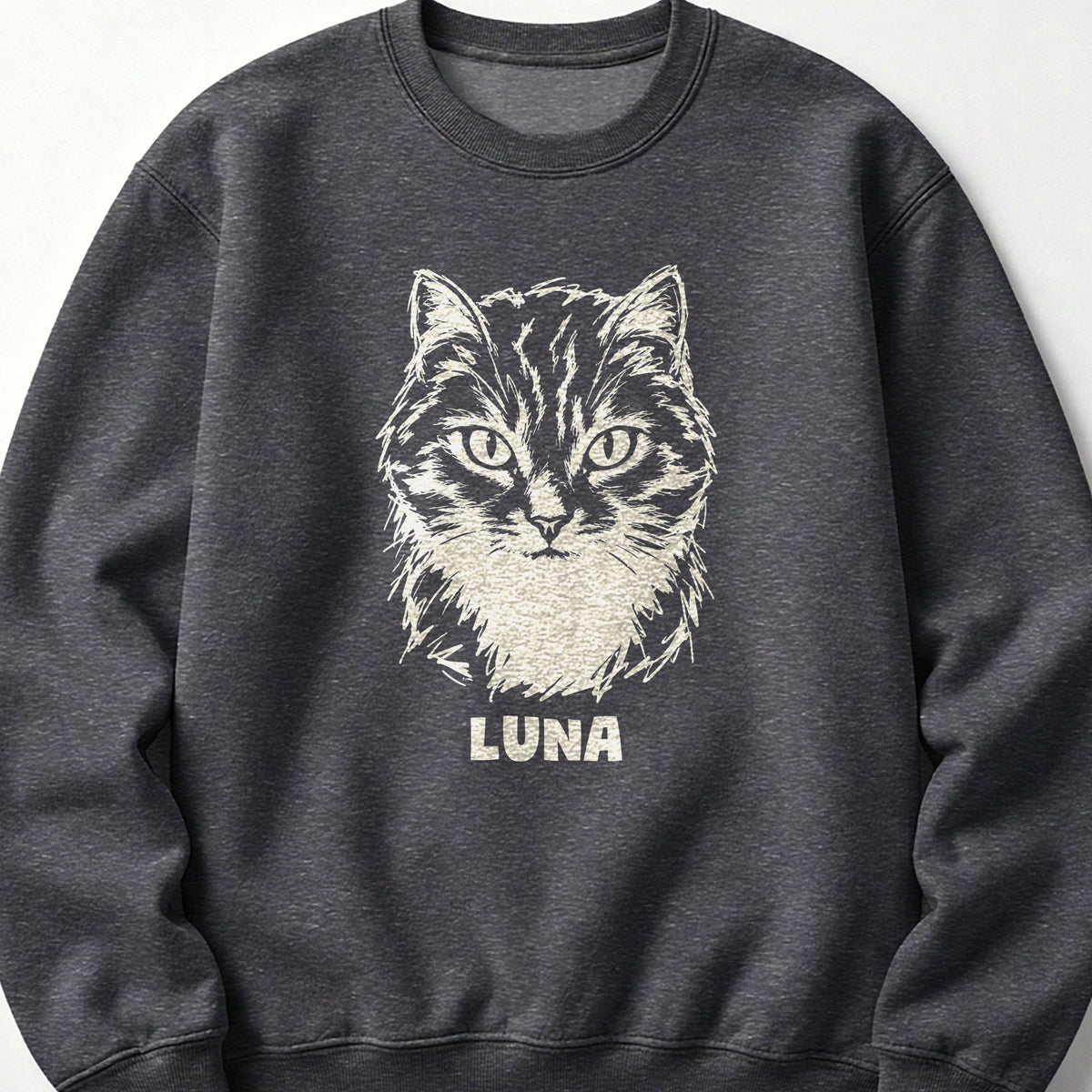 The Portrait Crewneck in Dark Heather with a portrait of a tabby cat and the name Luna