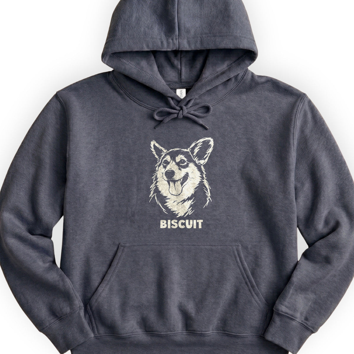 The Portrait Hoodie in Dark Heather with a portrait of a corgi and the name Biscuit