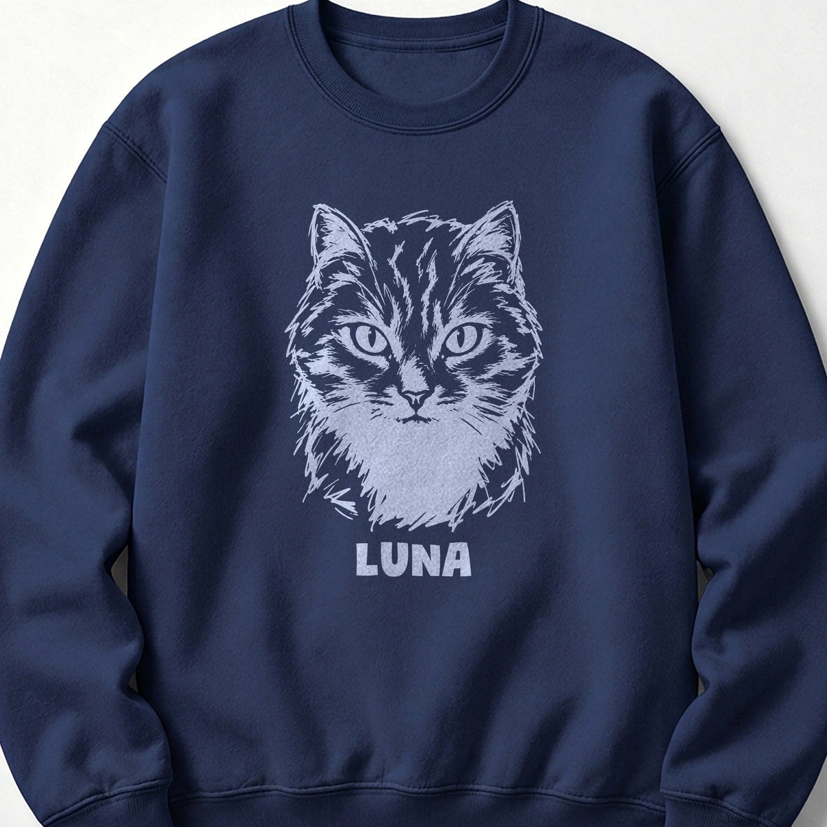 The Portrait Crewneck in Navy with a portrait of a tabby cat and the name Luna