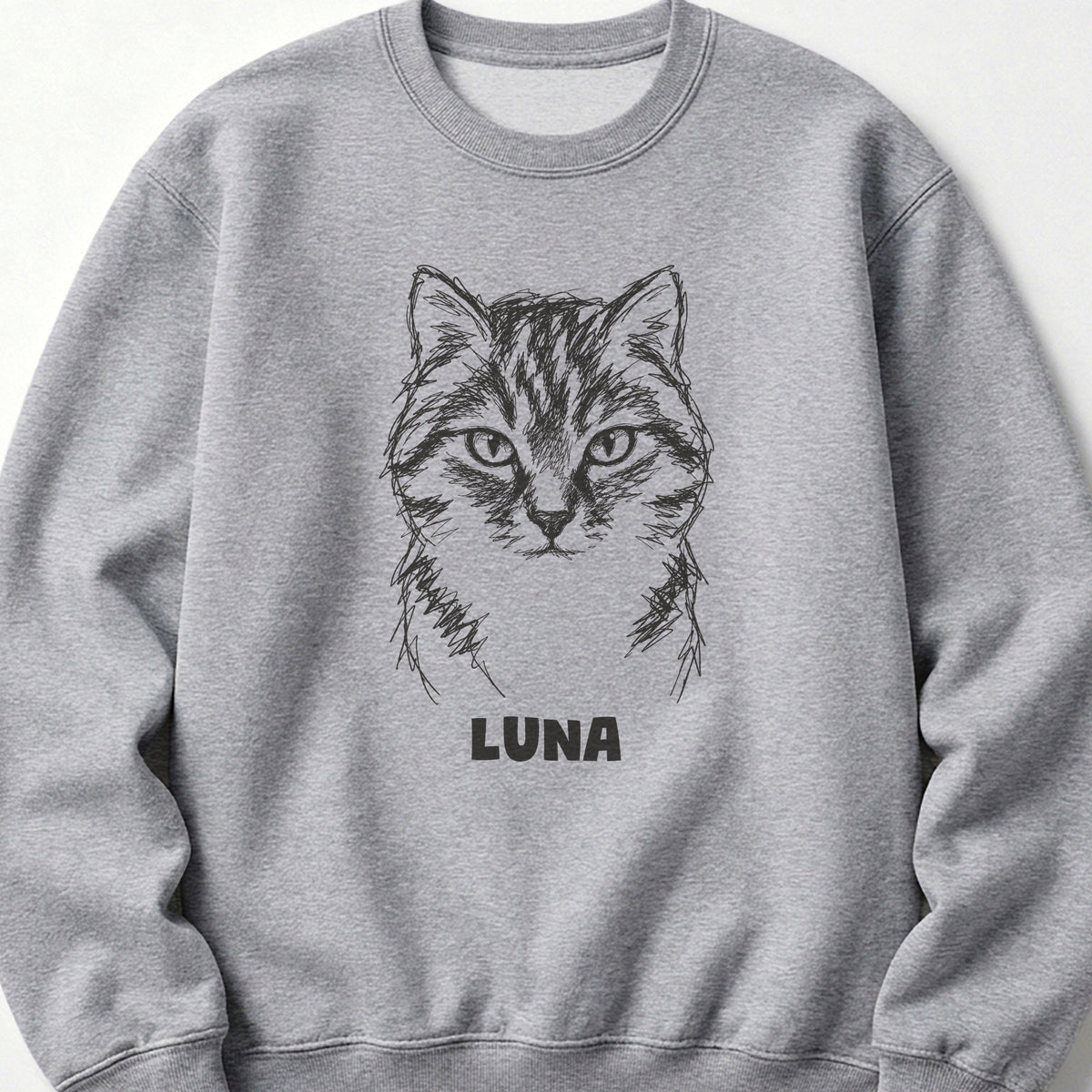 The Portrait Crewneck in Sport Grey with a portrait of a tabby cat and the name Luna